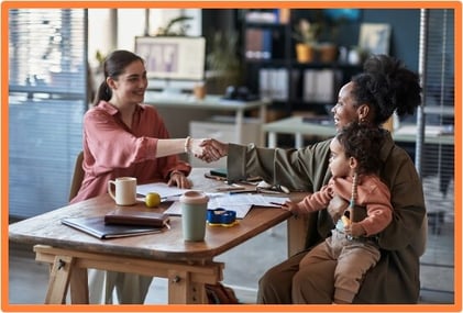 Parents reviewing Trump Account options and managing family finances online to save for their child’s future needs.