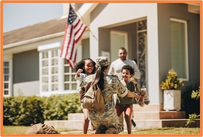 Military service member returning home and embracing children, highlighting family support and the relief of financial and tax advantages for veterans and active-duty personnel.