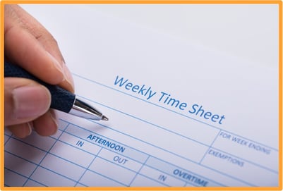 Close-up of a hand filling out a weekly time sheet, representing tracking overtime hours for potential tax deductions