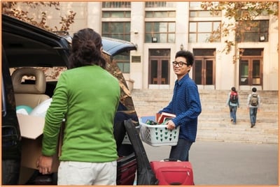 Student moving into a college dorm with a parent, representing the transition to campus life and the real costs of higher education.